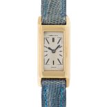 A LADY'S RARE 18K SOLID GOLD CARTIER NEW YORK RECTANGULAR BACK WIND "DUOPLAN" WRIST WATCH CIRCA 1946