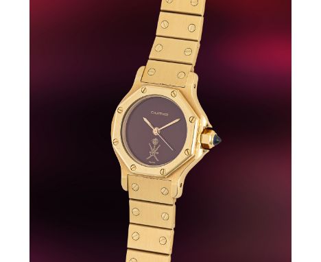 A FINE & RARE LADY'S 18K SOLID GOLD CARTIER SANTOS OCTAGONAL AUTOMATIC BRACELET WATCHCIRCA 1986, SPECIAL ORDER WITH BURGUNDY 