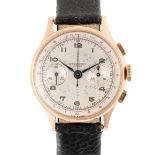 A GENTLEMAN'S SIZE 18K ROSE GOLD CHRONOGRAPH SUISSE CHRONOGRAPH WRIST WATCH CIRCA 1950 Movement: