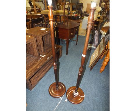 A PAIR OF MAHOGANY LAMP STANDARDS (2)