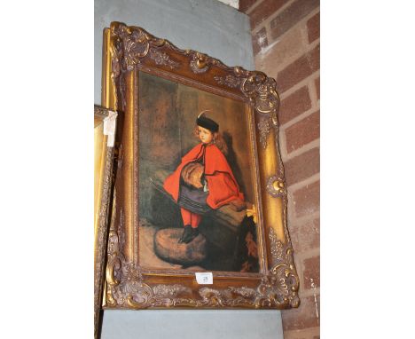 A GILT FRAMED PRINT OF A YOUNG GIRL