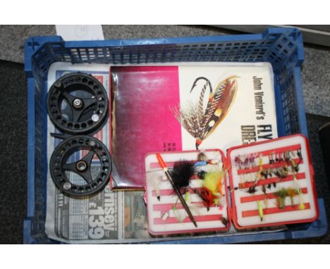 A BOX OF VINTAGE FISHING ACCESSORIES, WHEELS, FLYS ETC