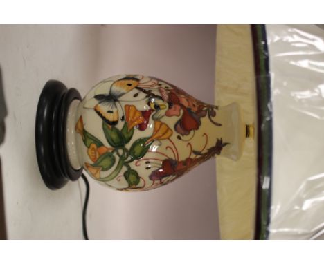 A MOORCROFT BUTTERFLY PATTERN TABLE LAMP WITH SHADE 