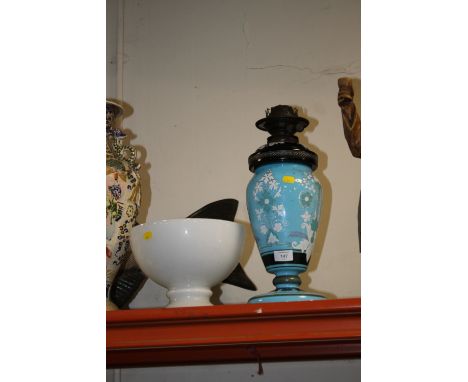 A VINTAGE FLORALLY PAINTED BLUE GLASS OIL LAMP WITH SHADE 