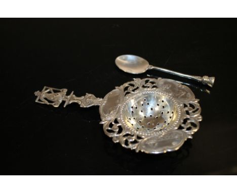 AN ANTIQUE DUTCH SILVER SIFTER SPOON TOGETHER WITH A SCOTTISH SILVER SPOON (2)