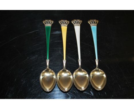 A SET OF FOUR DANISH STERLING SILVER AND ENAMEL SPOONS