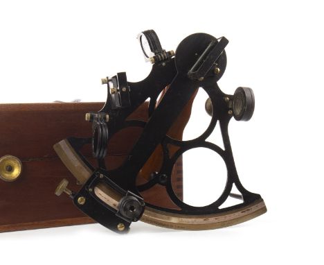 SEXTANT BY H. HUGHES &amp; SONS LTD. OF LONDON, serial no. 10920, with ebonised steel frame and bronzed arch dial, contained 