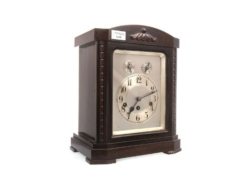 EARLY 20TH CENTURY MANTEL CLOCK, the round silvered dial with Arabic numerals below two subsidiary chiming dials, contained i