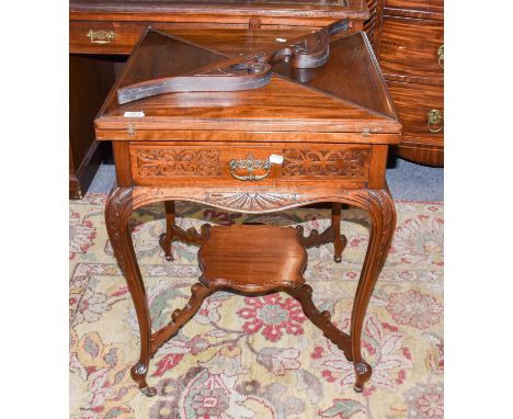 A 20th century mahogany envelope card table 57cm square by 76cm