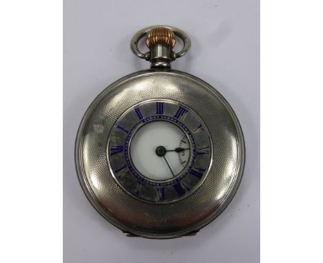 A Gentleman's Dennison Self Wind Half Hunter, solid silver and enamel pocket watch, the watch having a white enamel face with