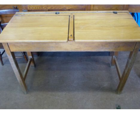 A Vintage Pine Double Seated School Desk, with lift up top, approx 69 x 45 x 102 cms.
