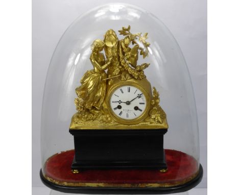 A 19th Century French Henri Marc Gilt Mantle Clock, depicting a young woman carving initials into the bark of a tree. White e