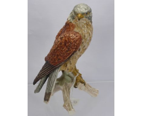 A Goebel Porcelain Figure of a Kestrel, impressed mark CV110-1969, together with a  hand painted plate signed Prado.