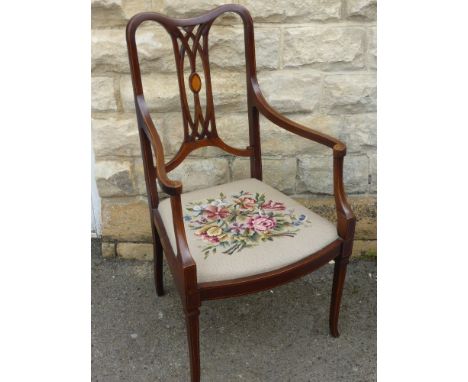 An Edwardian Inlaid Chair, with tapestry seat, on splayed legs.