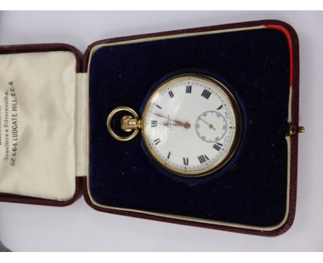 A Gentleman's 9 Ct Gold Self Wind J.W. Benson Open Face Pocket Watch. The watch having a white enamel face with Roman numeral