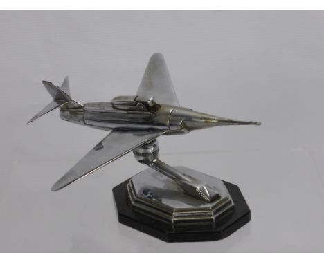 A Vintage Chrome Table Cigarette Lighter, in the form of a jet plane.