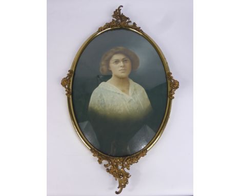 Eva Corine Rundlett Bonney Water Colour dated 1917, the portrait in a convex brass frame approx 48 x 33 cms. An active commun