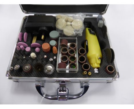 A Rolson Rotary Tool Kit with magnifier for fine engraving.