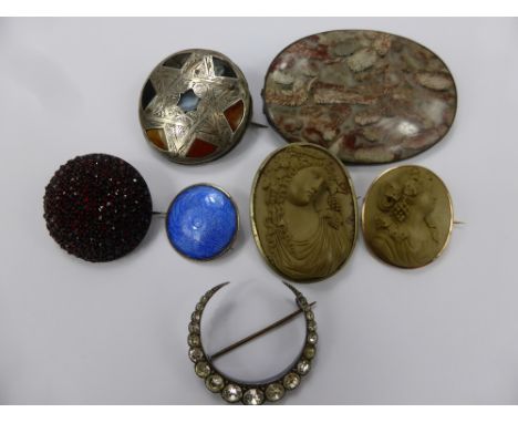 A Miscellaneous Collection of Antique Brooches, including fossil agate, cameo and enamel, some silver mounted together with a