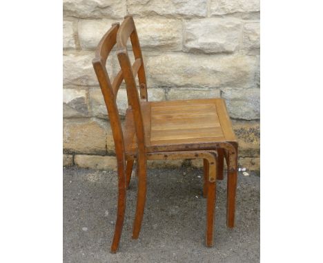 Eight Vintage Oak Kitchener Stacking Chairs.