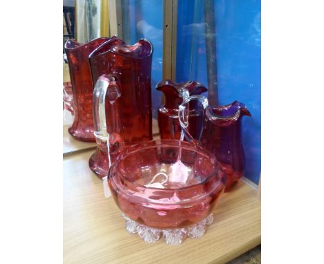 A Quantity of Victorian Cranberry Glass, including a bon bon dish, water pitcher, two creamers.(4)
