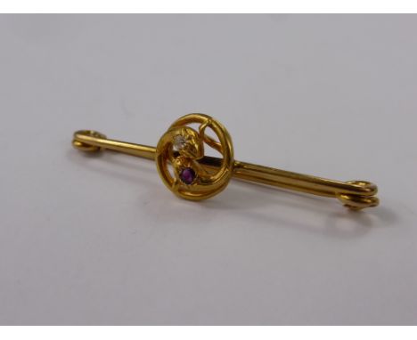 A Lady's 9 Ct Gilded Diamond and Ruby Brooch, approx 3.8 gms approx 3 pt old cut dia, 2 mm ruby.