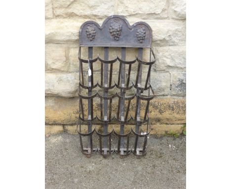 A Vintage Wrought Iron Metal 12 Bottle Wine Rack.