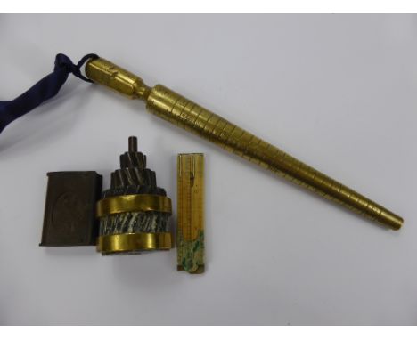 A Collection of Miscellaneous Vintage Items, including antique brass ring sizer, British Rope Ltd., wire and brass paper weig