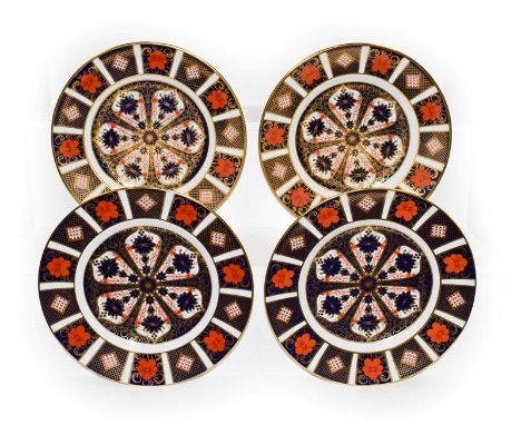Four Royal Crown Derby plates decorated in Imari pattern 1128, 21.5cm diameter.  First quality. Free from damage and repair. 