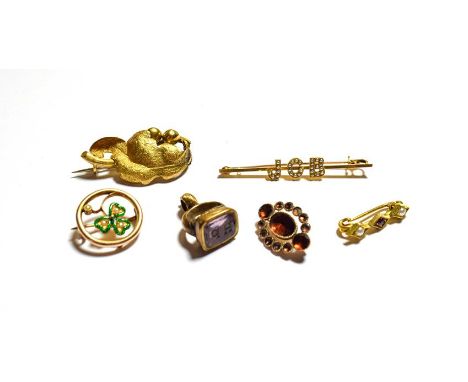 A split pearl and enamel brooch, stamped '15CT', 2.0cm diameter, a split pearl initial bar brooch, stamped '15CT', length 5.3