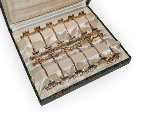 A cased set of twelve French silver plate knife rests, each in the Art-Deco style, with angular ends, in fitted case, the cas