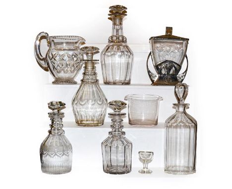 A tray of mainly antique glass including Georgian decanters, a jug, eye bath, wine rinser and an Art Nouveau metal biscuit bo