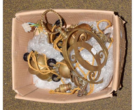 A pair of brass rise and fall light fittings