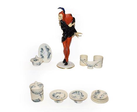 A Hutschereuther porcelain figure of Mephistopheles and a Luneville pottery part doll's tea service, circa 1880-1920 .  Mephi