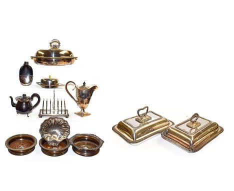 Two trays of mixed silver plated items to include three entree dishes with covers, wine coasters, seven bar toast rack with g