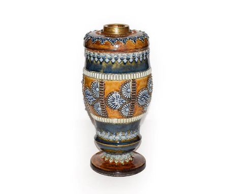 A Doulton Lambeth glazed stoneware oil lamp with glass reservoir