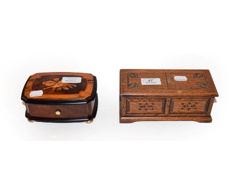 A modern Swiss cylinder music box in marquetry case, makers Reuge Music, playing the Magic Flute, W A Mozart, together with a