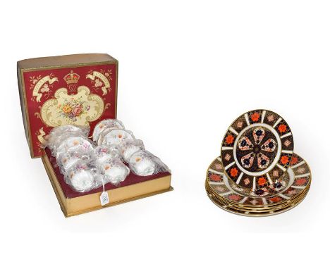 A Royal Crown Derby six place coffee set decorated in the Derby posies design and in original box, together with four Royal C