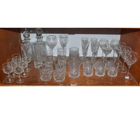 Assorted glassware to include Waterford, Stuart Crystal etc (qty on one shelf)