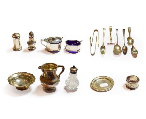 A selection of silver including Victorian cream jug, pin tray, two salts with blue glass liners, two peppers, small dish, cad