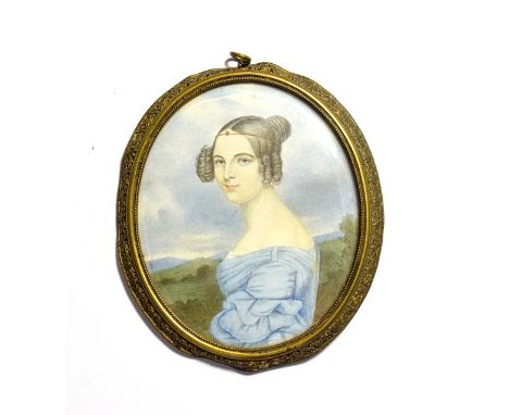 An early 19th century portrait miniature of a lady in a landscape, signed E. Peter.  Plaque itself free from cracks, paint fr