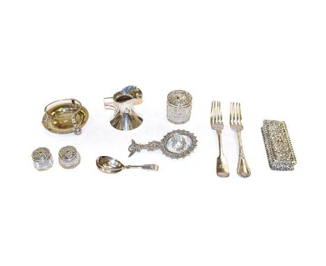 A collection of silver, including a George III silver fiddle pattern caddy spoon, two Victorian silver dessert forks, differi