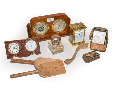 a Brass carriage time piece with white enamel dial, a dual travel pocket watch and aneroid barometer mounted within a leather