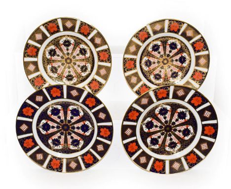 Four Royal Crown Derby plates decorated in Imari pattern, 1128, 21.5cm diameter.  First quality. Free from damage and repair.