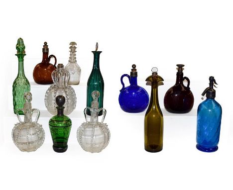 A quantity of 19th century and later coloured glassware, including decanters and a soda syphon (two trays)