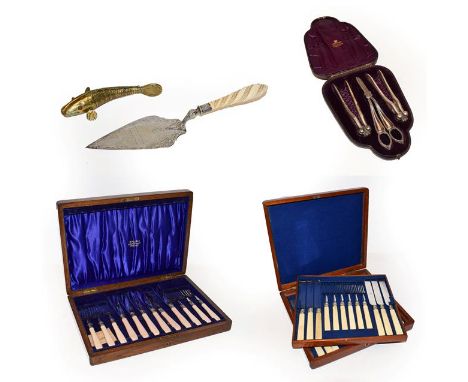 A cased set of silver plated fish knives and forks, another set of fruit knives and forks, a Victorian ceremonial silver plat