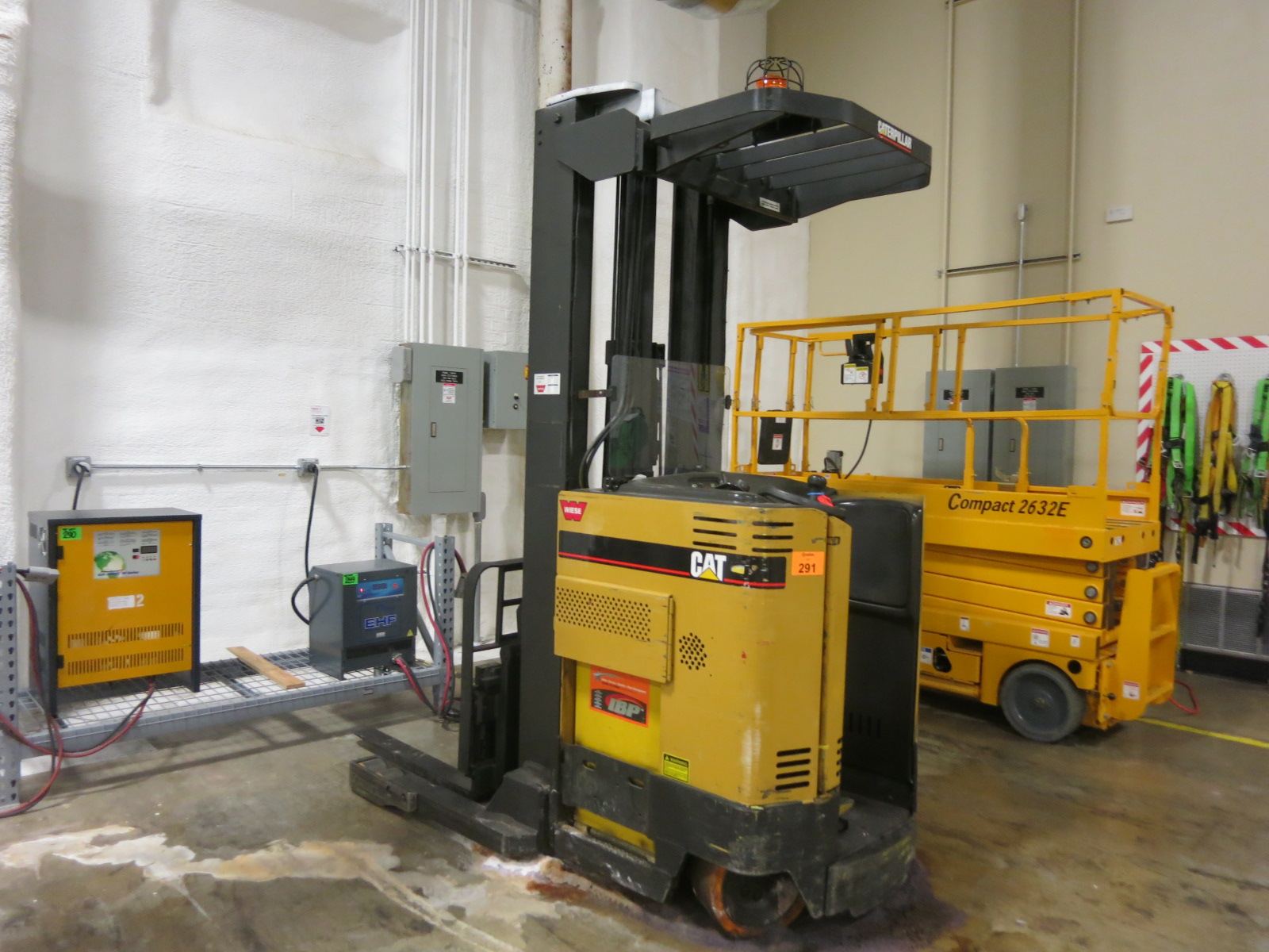 Caterpillar electric stand up reach in forklift, model NRDR30, s/n