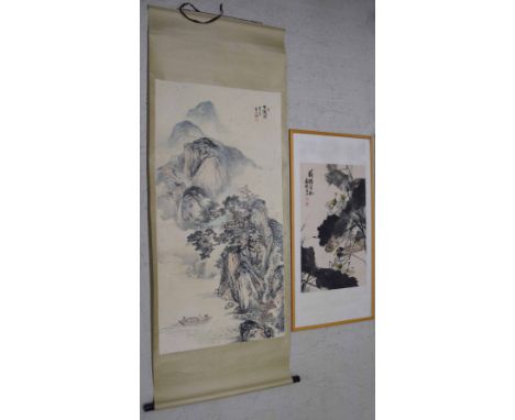 Decorative Chinese scroll watercolour of a lake and mountain landscape, figures in a boat in the foreground, signed to top ri