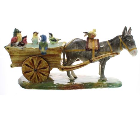 French Jerome Massier Fils Vallaumis Majolica glaze planter, modelled as a donkey pulling a cart with birds perched on the si