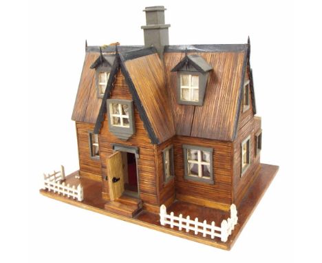 Scratch built dolls house modelled as the Otterburn Hall Gamekeepers Lodge in Northumberland, made from lolly sticks by a Nei